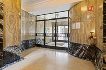 This classy one-bedroom apartment with a 2 terraces and 2 spacious attic storerooms is located on the 2nd floor of a co-ownership building, perfectly situated in the European Quarter, between Schuman and Brussels Park.

The apartment is arranged as follow