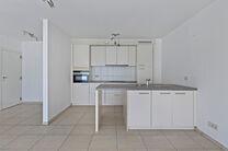 Unique opportunity: Move-in ready ground-floor apartment with two bedrooms, two terraces, a private garden, and a large shared garden with pond. Located in a small-scale residence of just eight units, within walking distance of Grimbergen’s center and r