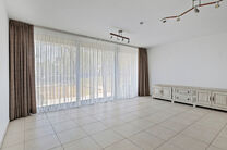 Unique opportunity: Move-in ready ground-floor apartment with two bedrooms, two terraces, a private garden, and a large shared garden with pond. Located in a small-scale residence of just eight units, within walking distance of Grimbergen’s center and r