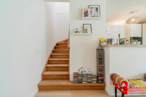 This recent two-bedroom family home with a pleasant terrace/garden is quietly located at the rear of a residential building, right in the center of Brussels. The property is part of a well-maintained co-ownership and includes an underground parking space 