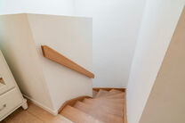 This recent two-bedroom family home with a pleasant terrace/garden is quietly located at the rear of a residential building, right in the center of Brussels. The property is part of a well-maintained co-ownership and includes an underground parking space 